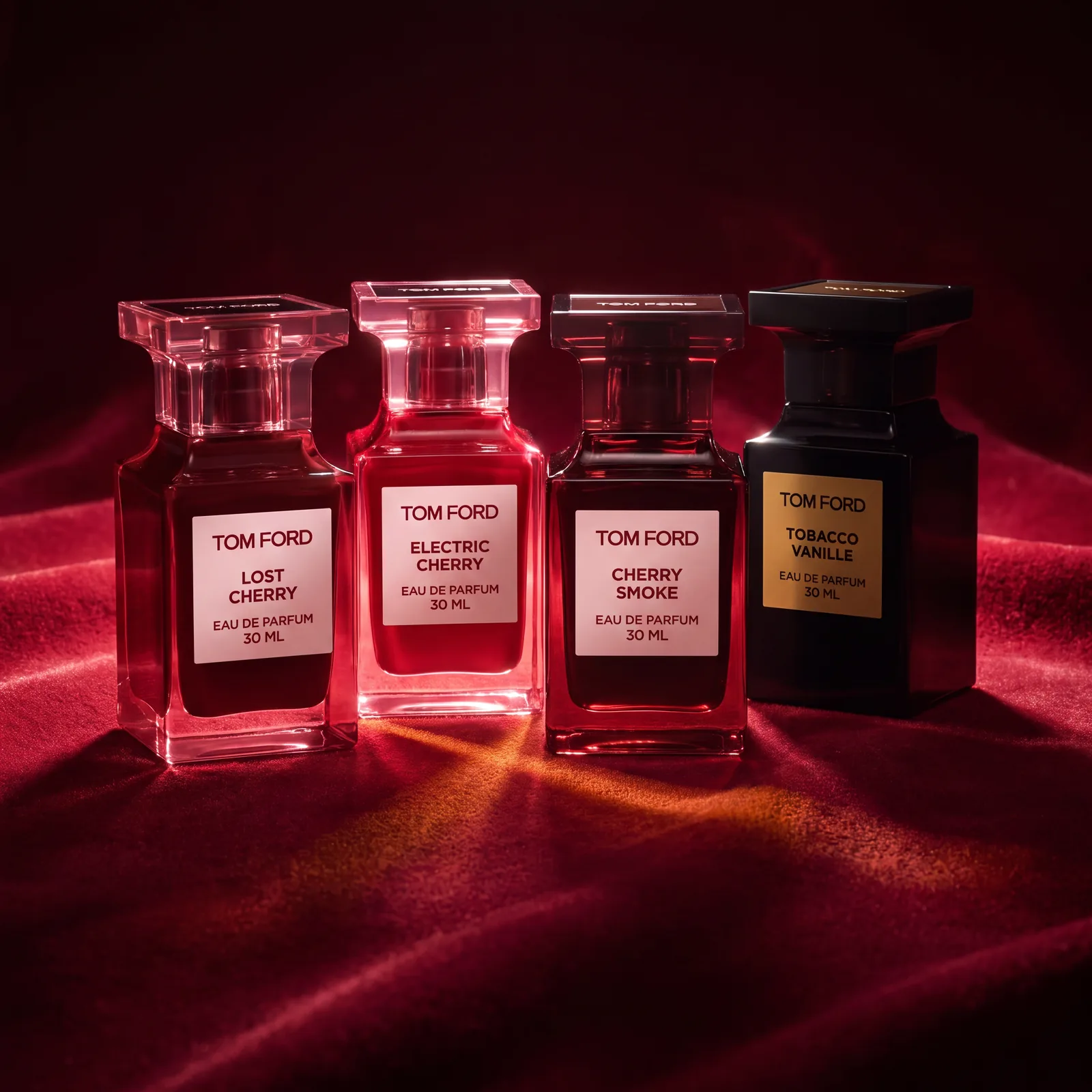 Cztery flakony Tom Ford Miniature Modern Collection na czerwonym aksamicie